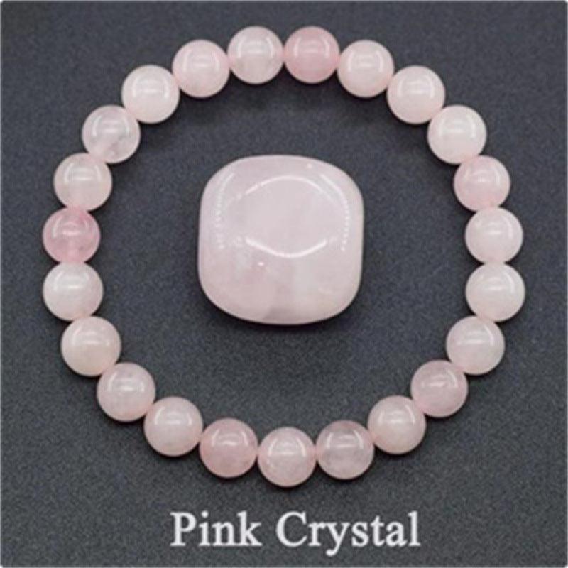 Detailed view of the Pink Crystal bracelet, capturing the gentle pink hue and smooth finish, symbolizing love and emotional well-being.